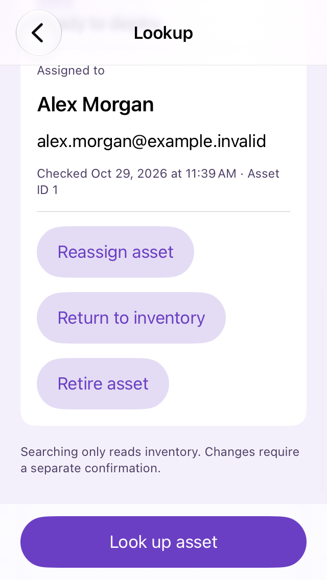 Lookup result for a demo laptop with a fictional assignee and buttons to reassign, return to inventory or retire.